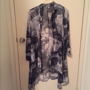 A beautiful light colored mesh cover up! :)